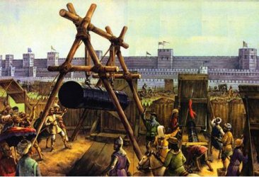 Asedio de Constantinopla. Un arma de asedio golpea unas murallas de maderas. Detrás se ven los muros de la ciudad